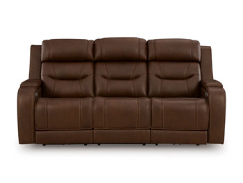 Ashley Furniture Knightington power reclining sofa with audio seating, showing plush upholstery and built-in speaker system.