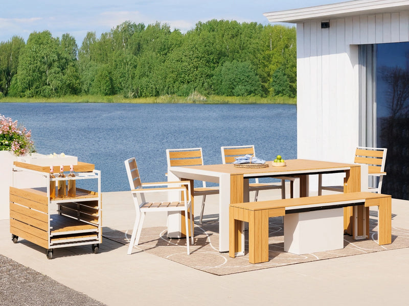 Transformer Table outdoor dining set with expandable table and matching chairs on a patio