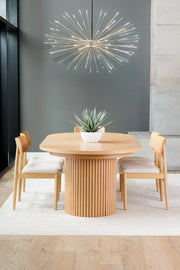 Transformer Table round dining table in a modern wood finish