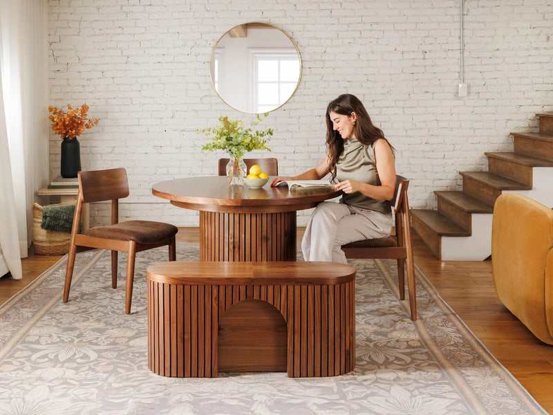 Transformer Table round dining set with expandable round table and matching dining chairs in a modern interior