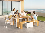 Transformer Table outdoor dining set with expandable table and matching chairs in an outdoor setting