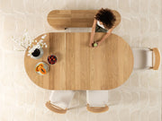 Transformer Table round dining table with a sleek tabletop and sturdy central pedestal base