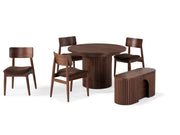 Transformer Table round dining set with a round table and matching chairs in a modern dining room