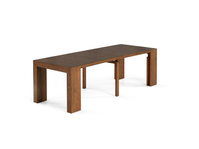 Transformer Table extendable dining table in a modern wood finish.