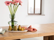 Transformer Table expandable dining table in wood finish, shown fully extended