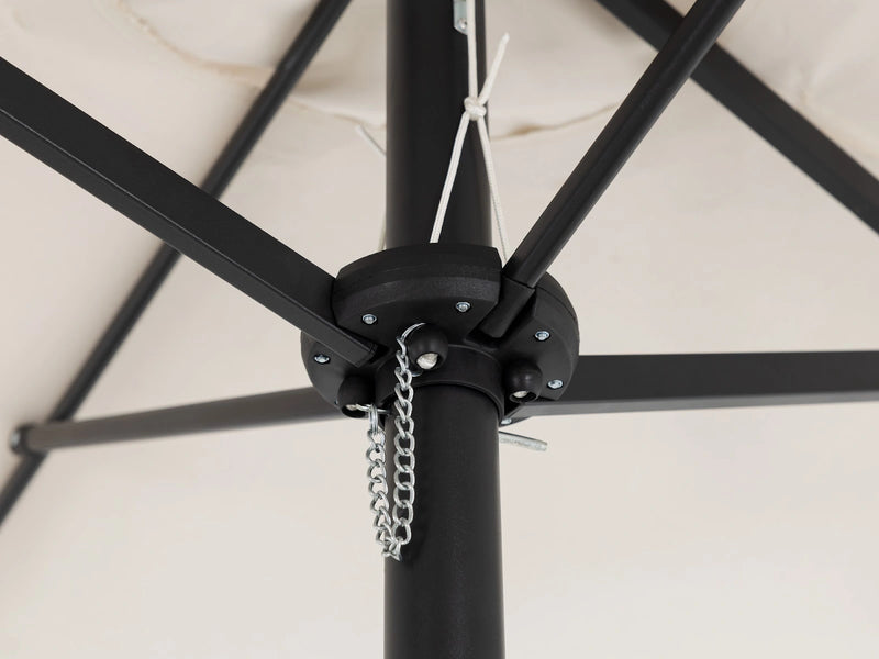 Transformer Table outdoor patio umbrella in a neutral shade, shown open for outdoor dining and shade