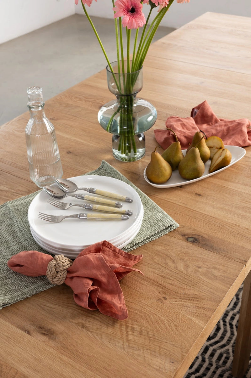 Transformer Table dining table with a modern extendable design in a neutral finish