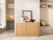 Transformer Table round sideboard buffet in a modern design, shown closed with a smooth tabletop and storage base