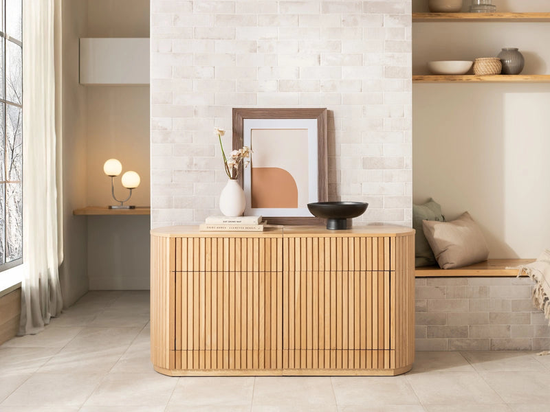 Transformer Table round sideboard buffet in a modern design, shown closed with a smooth tabletop and storage base