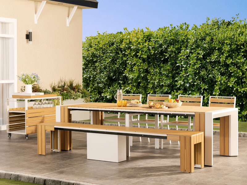 Transformer Table outdoor dining set with expandable table and matching chairs on a patio