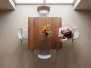 Transformer Table Nova dining table, modern expandable wood table shown in a neutral interior setting