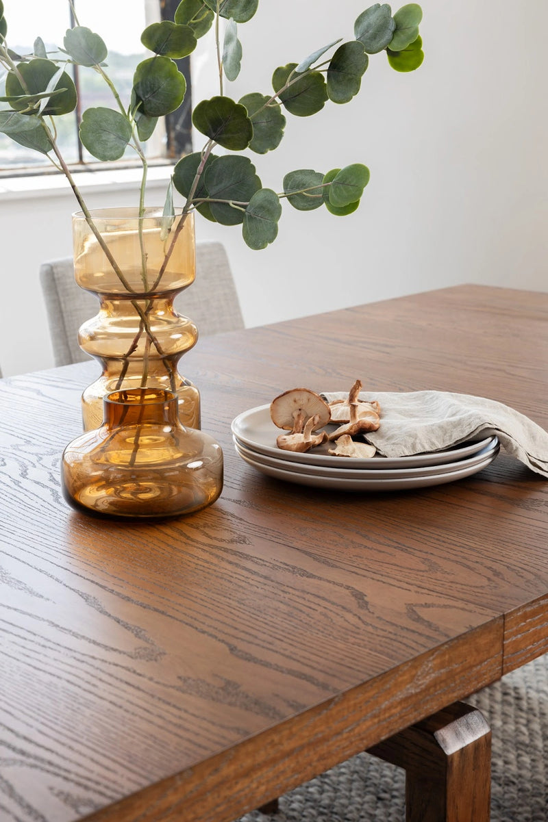 Transformer Table dining table with adjustable extension leaves in a modern wood finish