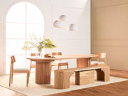 Transformer Table round dining set with round table and matching dining chairs in a modern interior