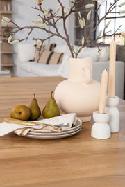 Transformer Table dining table in its compact configuration with a modern, extendable design