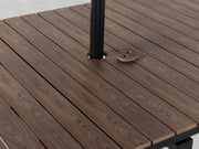 Transformer Table outdoor dining table by Transformer Table, expanded with a durable wood-look tabletop and sturdy legs