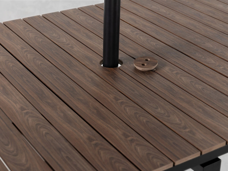 Transformer Table outdoor dining table by Transformer Table, expanded with a durable wood-look tabletop and sturdy legs