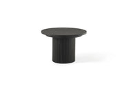 Transformer Table round dining table in a modern design, shown fully assembled with a smooth tabletop