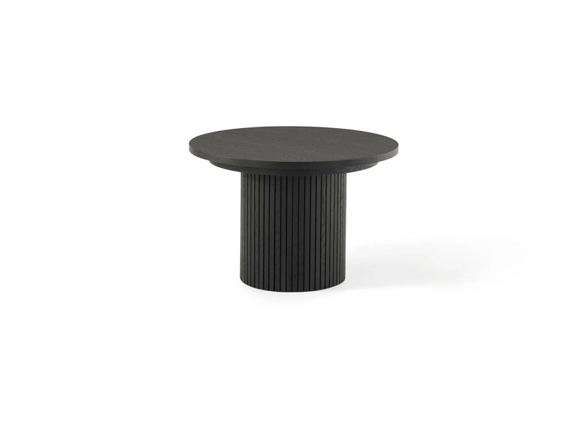 Transformer Table round dining table in a modern design, shown fully assembled with a smooth tabletop