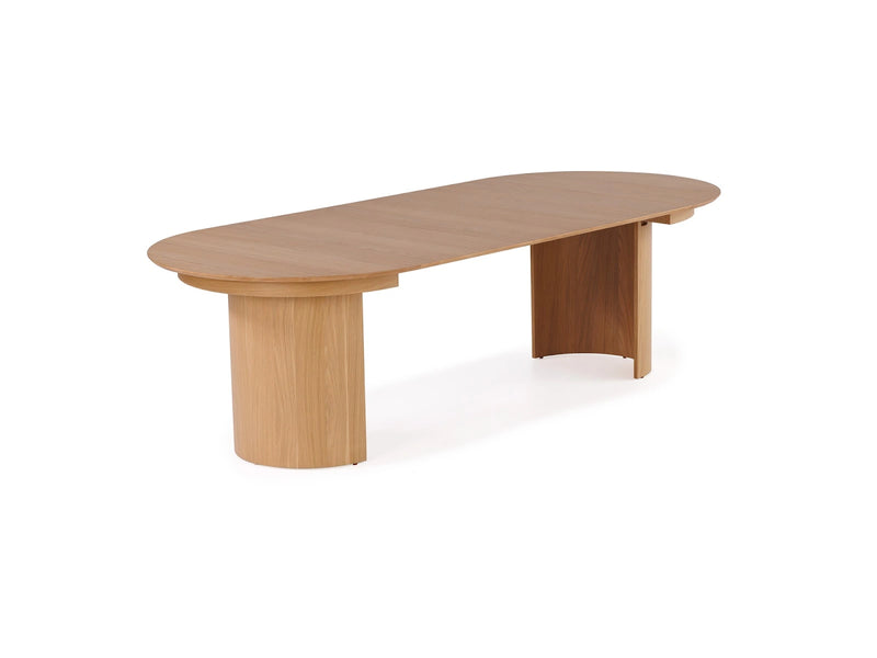 Transformer Table Eclipse dining table in a modern round design, shown in a neutral finish