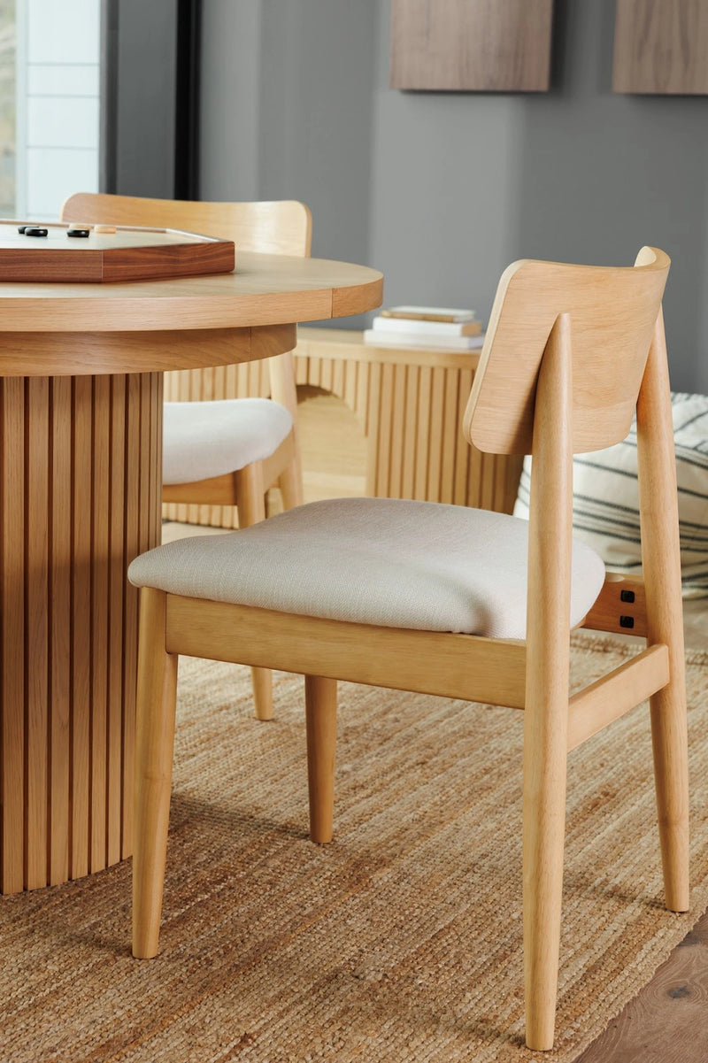 Transformer Table Round Chair dining chair in a modern rounded design.
